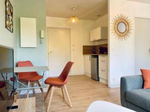 Appartements Le Saint-Lois : photos des chambres
