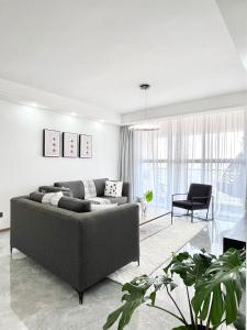 modern executive three bedroom apartment which features a swimming pool, state of the art fully equipped gym andmodern unmatched luxurious facilities which offfers luxury and comfort