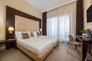 Superior Twin Room room in iH Hotels Milano Watt 13