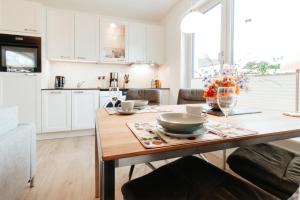 Appartement Kranich - Moderne Ferienwohnung direkt am Schloss Ranzow!