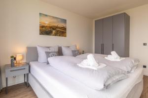 BeltBlick 24 – Moderne Ferienwohnung mit Dachterrasse und Meerblick!