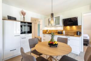 Villa Dornkamp 4 - Luxuriöse Ferienwohnung für 4 Personen inklusive Balkon und Sauna