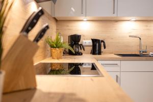 Dorumer Seestern - Ferienwohnung mit Terrasse und Sauna