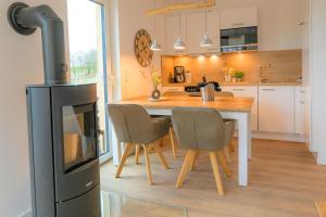 Deichbude Tossens - Modernes Ferienhaus für 4 Personen