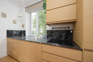 Bright Apartment Andersa Warsaw Near Ogrod Krasinskich and Old Town by Noclegi Renters
