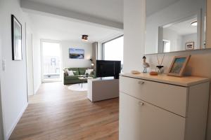 BeltBlick 11 – Ferienwohnung mit unverbautem Meerblick & Dachterrasse!