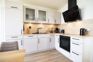 BeltBlick 11 – Ferienwohnung mit unverbautem Meerblick & Dachterrasse!