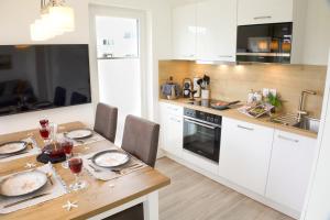 Meerzeit Tossens - Mit Infrarotsauna, Garten und Dachterrasse