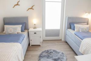 Meerzeit Tossens - Mit Infrarotsauna, Garten und Dachterrasse