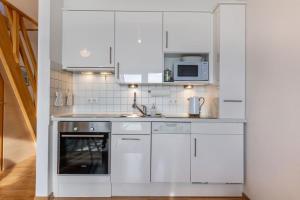 Inselblume 18 - Ferienwohnung mit Meerblick & Galerie in der Strandburg