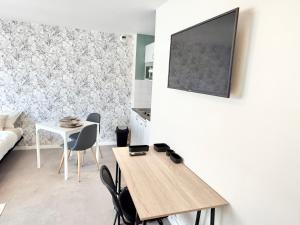 Appartements Studio clair rivage centre-ville : photos des chambres