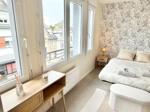 Appartements Studio clair rivage centre-ville : photos des chambres