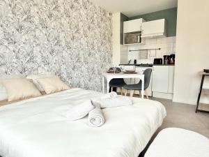 Appartements Studio clair rivage centre-ville : photos des chambres