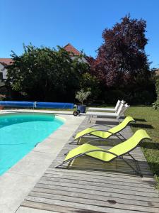 Appartements Le Grenier - Piscine et SPA : photos des chambres