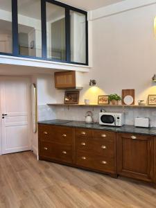 Appartements Appartement L-Intemporel : photos des chambres