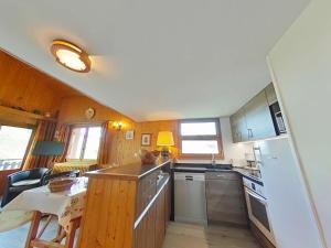 Appartements Appt 3 pieces avec mezzanine, 6 couchages, proche commerces et pistes, parking couvert - FR-1-241-189 : photos des chambres