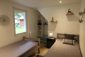 Chalets Chalet 6 personnes au Menil - Vosges - Vacances nature en famille : photos des chambres