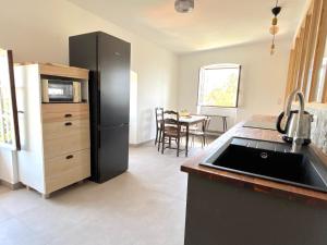 Appartements L-appartement Montenosa : photos des chambres