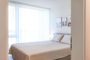 Lykke – Traumhafte Ferienwohnung mit Garten und Meerblick in erster Reihe!