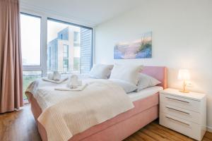 Hygge – Familienfreundliche Ferienwohnung mit Garten & Meerblick