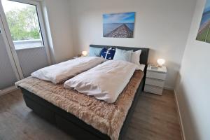 KÜSTE3348 – Penthousewohnung mit Dachterrasse, Sauna - strandnah!