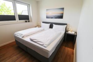 KÜSTE3320 – Exklusive Ferienwohnung mit Sauna & nah am Strand!