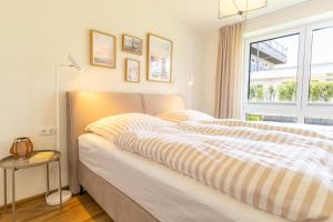 Seashine - Moderne Ferienwohnung mit 2 Schlafzimmern, Sauna, Terrasse und Garten in Kellenhusen