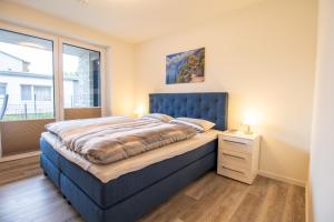 Ankerplatz 3 - Moderne Ferienwohnung mit Terrasse und Sauna - strandnah!