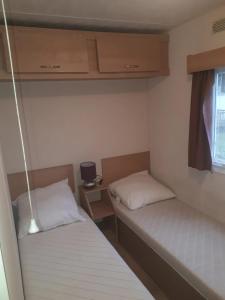 Maisons de vacances Bungalow charmant a Clohars-Carnoet - 38 m² avec piscine : photos des chambres