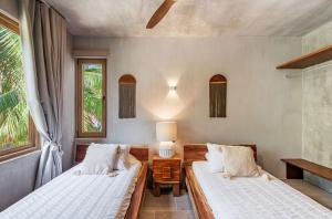 Beachfront Tankah 3 villa for 18 guests!