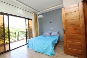 AfriqPnB RF2 Chambre Mvog Ekoussou avec Piscine - Ubytování bez kategorie ve městě Kribi