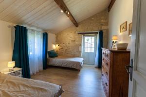 Maisons de vacances La Roche des Bois, maison classee *** (8 pers) : photos des chambres