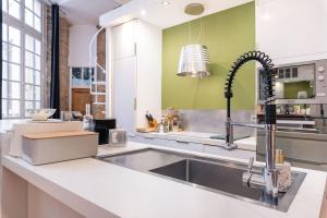 Appartements Le Central - 200 m apartment in the heart of the city : photos des chambres