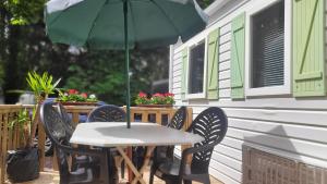Mobil-home N 3 chambre, climatisé, cuisine équipée, TV & Wi-Fi