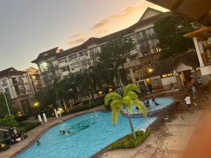 1 Bedroom unit with balcony and facing amenities and just beside SM Ecoland