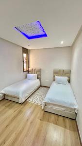 T1 App moderne 2 chambres, a 10 min du Stade Moulay Abdellah