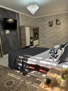 Апартаменты на Калдаякова - 3hvězdičkové hotely ve městě Šymkent