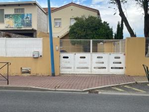 Appartements T3 rdc, terrasse ombragee, parking avec portail : photos des chambres