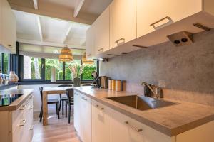 Boshuisje Rekem - Rivus