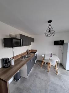 Appartements Entre Terre et Mer, logement cosy : photos des chambres