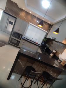 Casa com dois quartos com piscina próx shopping