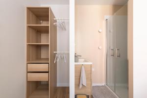 Appartements CDC 3, appartement 2 chambres avec SDB privatives et parking inclus : photos des chambres