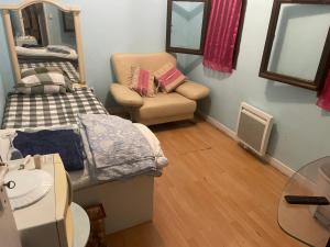 Sejours chez l'habitant Chambre avec parking prive : photos des chambres