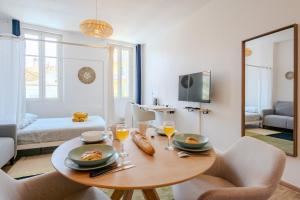 Appartements Studio Soleil & Couleurs - 100m du Port : photos des chambres