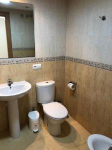 Bajo con Jardín junto al mar de vera playa