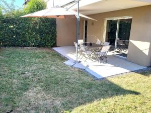 appartement 2 chambres, jardin privé et garage