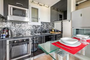 Appartements Appartement avec vue sur la Tour Eiffel entre Paris et Disneyland : photos des chambres