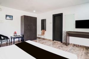 Hotel O Bhangagarh Near Nemcare Hospital