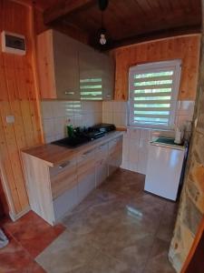 Domki "Nad Rzeką Solinką" Tomasz Pasławski