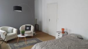 Appartements Maison avec grand jardin au coeur de la ville : photos des chambres